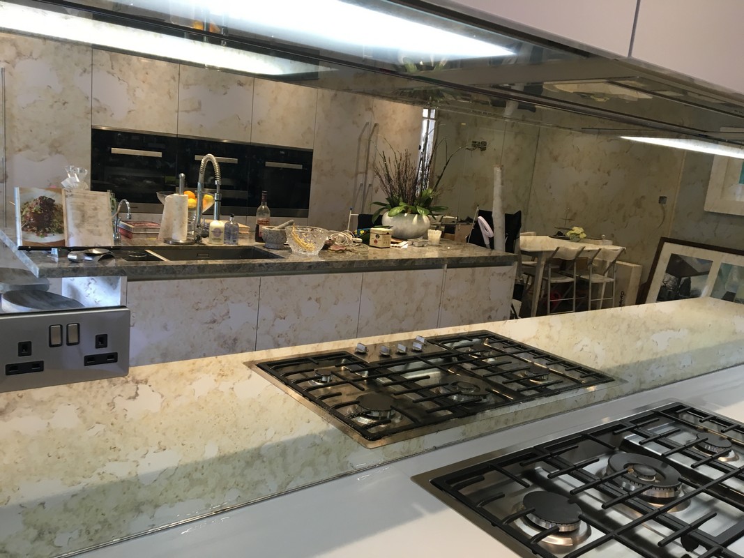 Mirror glass splashback in Staines-upon-Thames luxury kitchen