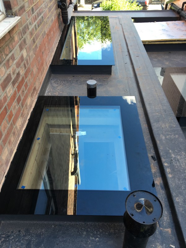Multiple flat roof skylights on extension in Staines-upon-Thames